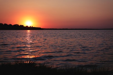 Photo of Amazing view of beautiful sunset on riverside