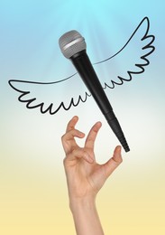Image of Freedom of speech. Microphone with wings flying away from woman, trying to grab it on gradient background, closeup