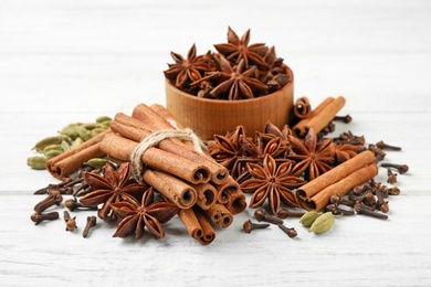 Photo of Composition with mulled wine ingredients on white wooden table