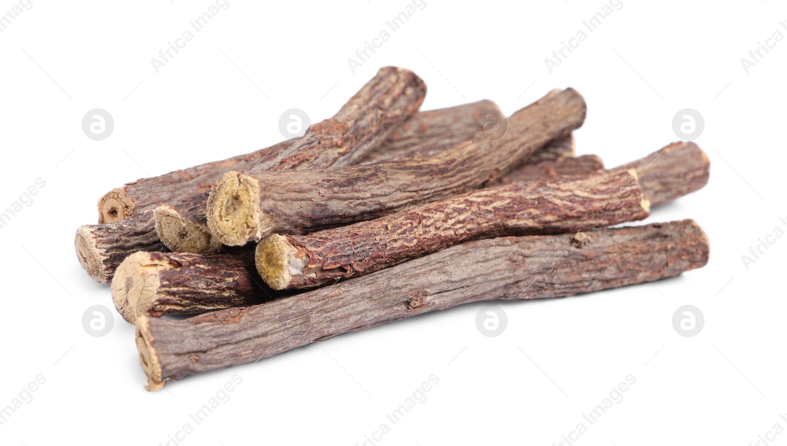 Photo of Dried sticks of liquorice root on white background