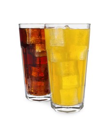 Glasses of different refreshing soda water with ice cubes isolated on white