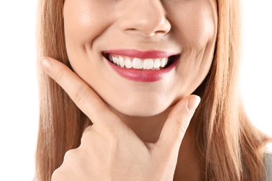 Smiling woman with perfect teeth on white background, closeup