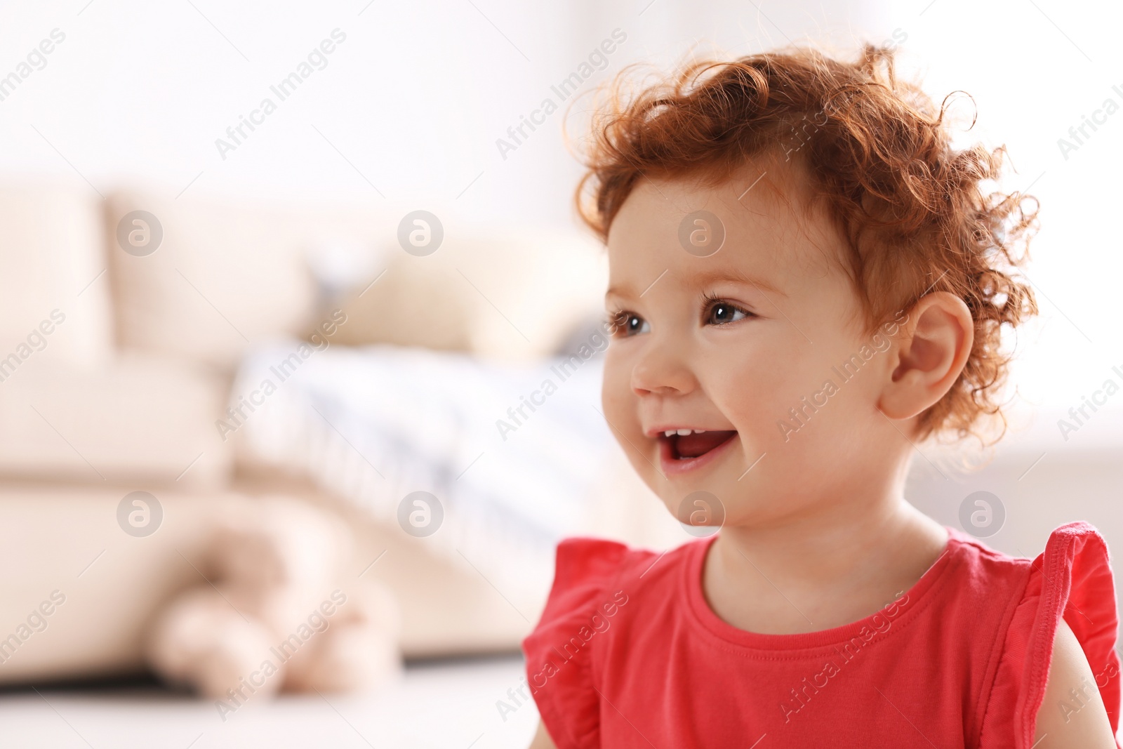 Photo of Portrait of cute little child at home