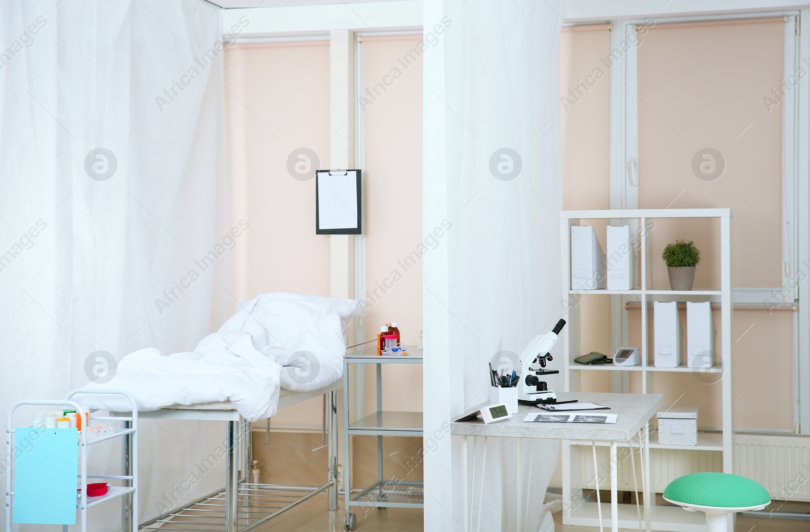 Photo of Modern interior of doctor's office with couch