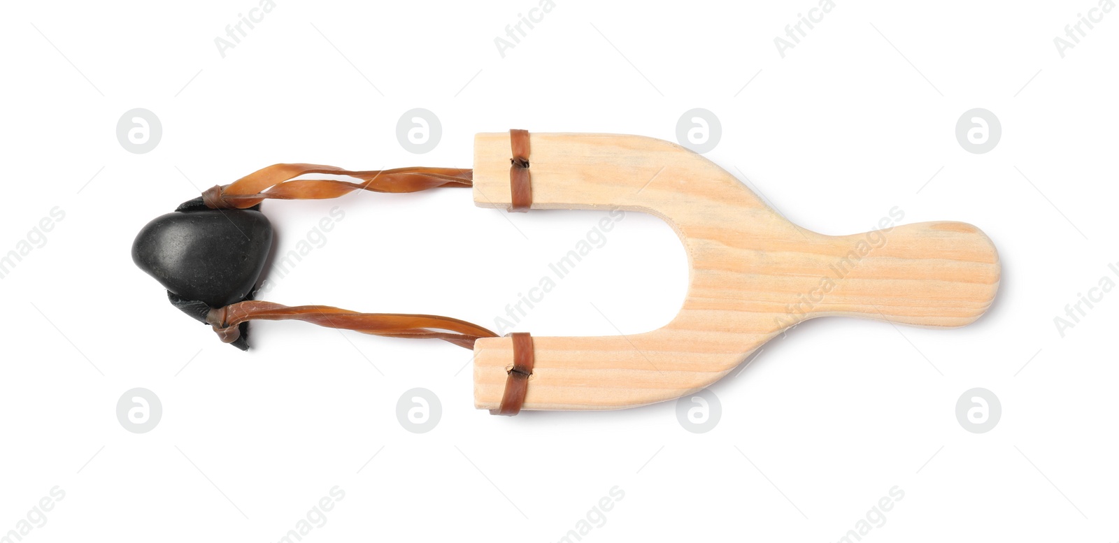 Photo of Wooden slingshot with pebble isolated on white, top view