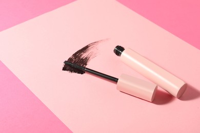 Mascara for eyelashes on color background. Makeup product