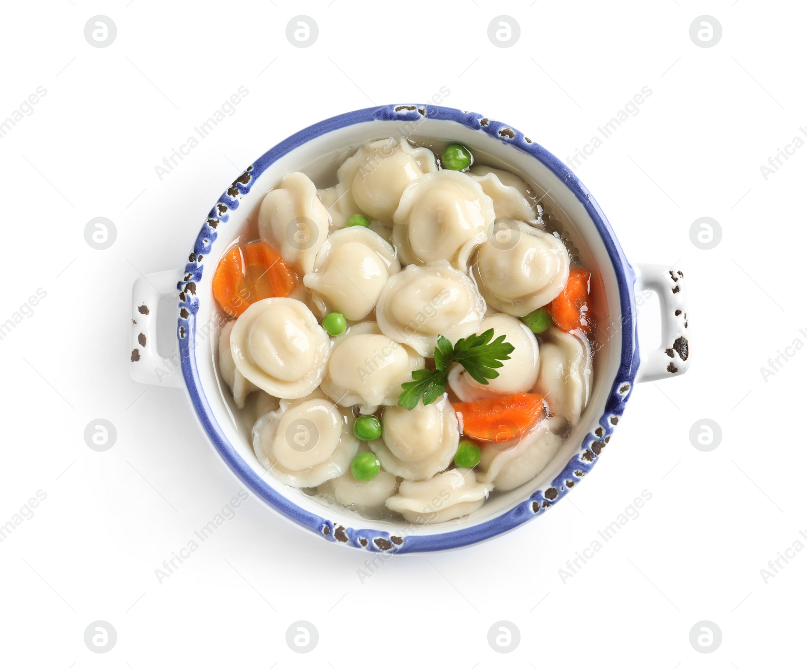 Photo of Bowl of tasty dumplings in broth isolated on white, top view