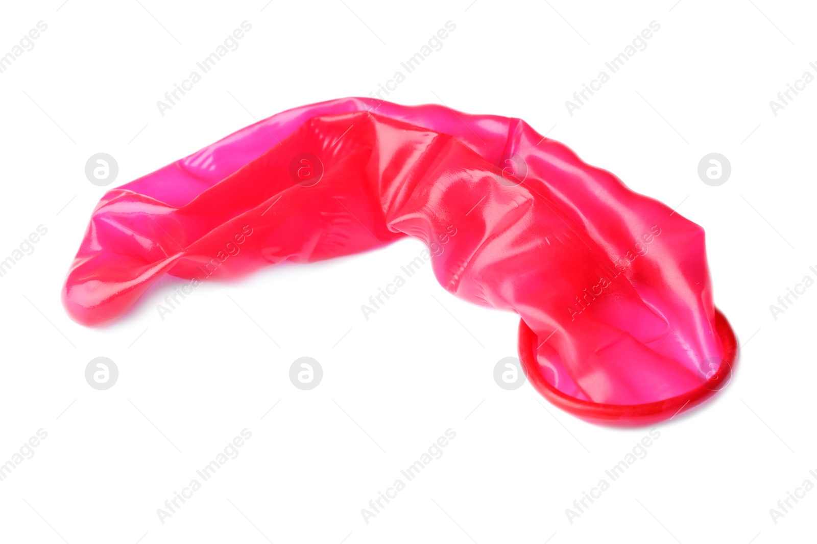 Photo of Red used condom on white background. Safe sex concept