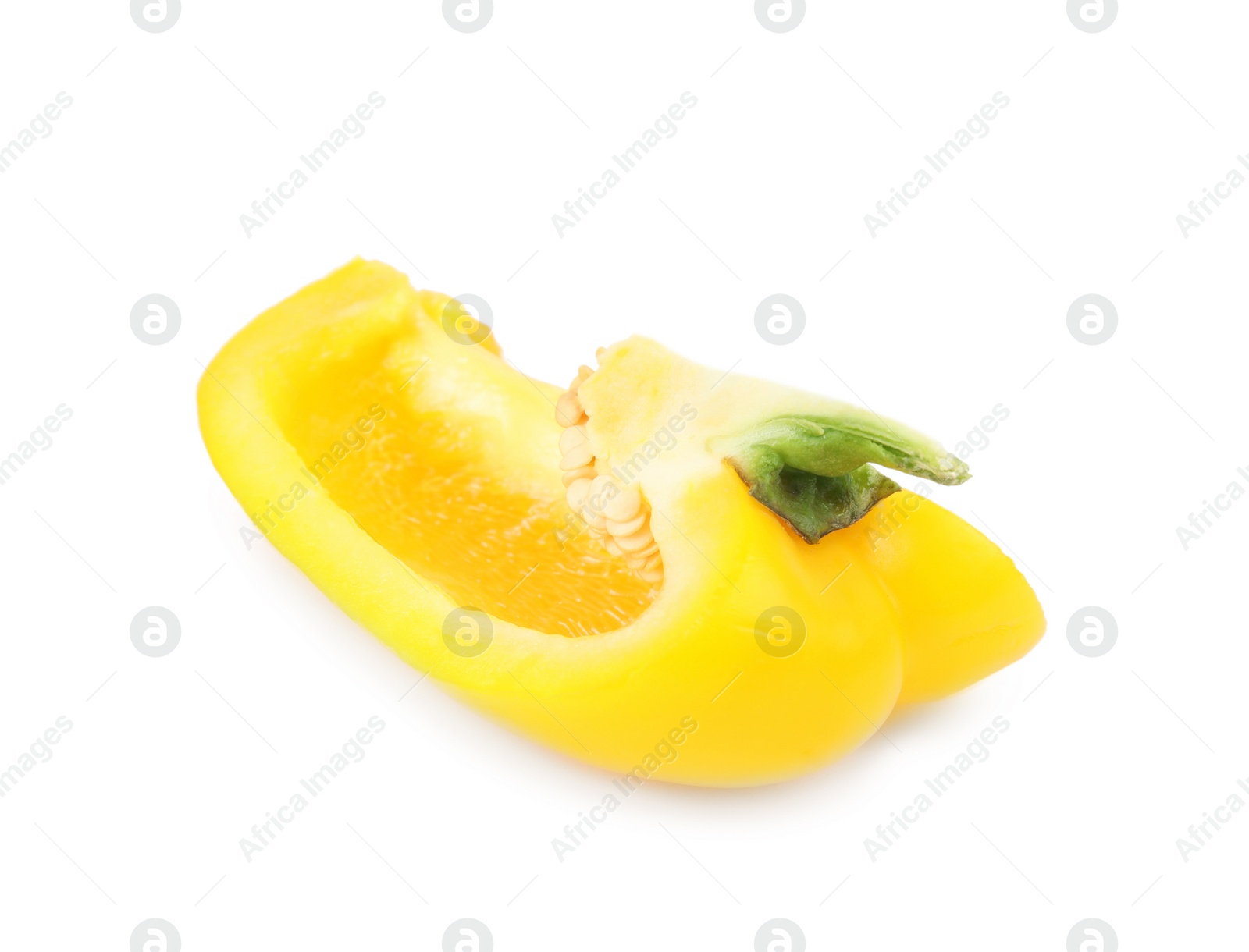 Photo of Cut yellow bell pepper with seeds isolated on white