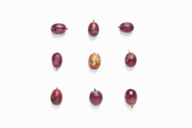 Fresh ripe juicy grapes on white background, top view