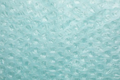 Photo of Texture of bubble wrap as background, top view