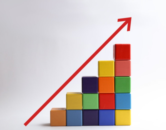 Image of  Career promotion concept. Stairs made of colorful cubes and arrow on white background