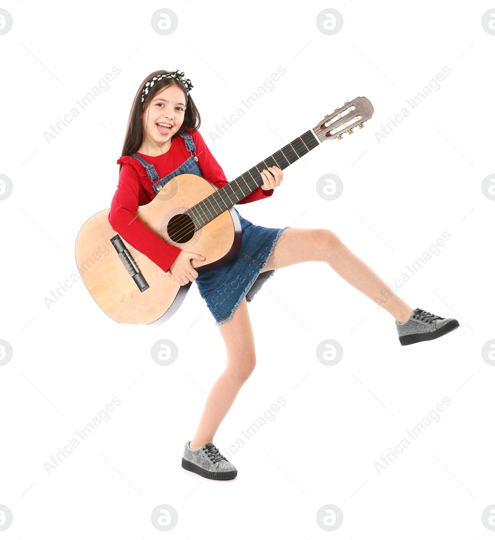 Photo of Emotional little girl playing guitar, isolated on white