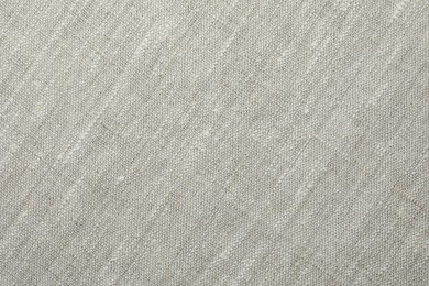 Texture of light grey fabric as background, top view