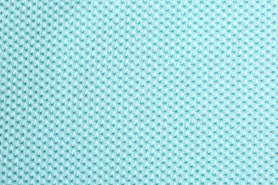 Photo of Textured light blue fabric as background, closeup