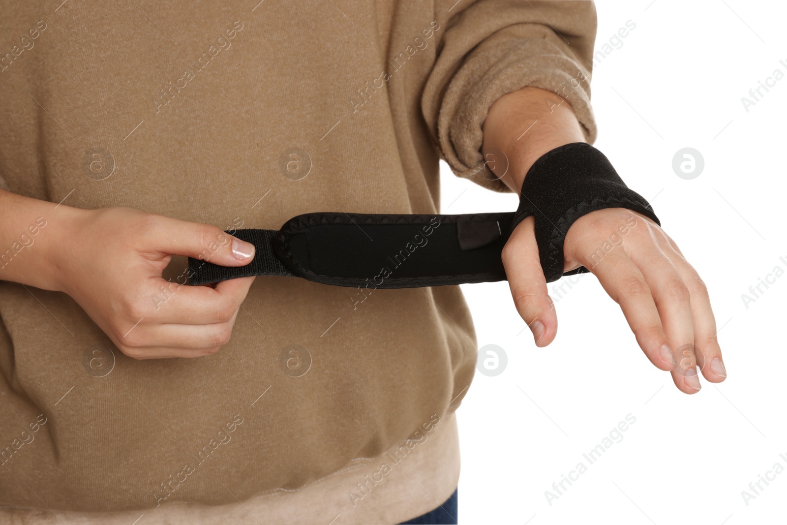 Photo of Woman wrapping hand in medical bandage on white background, closeup