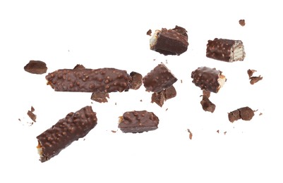 Image of Pieces of tasty chocolate bars falling on white background