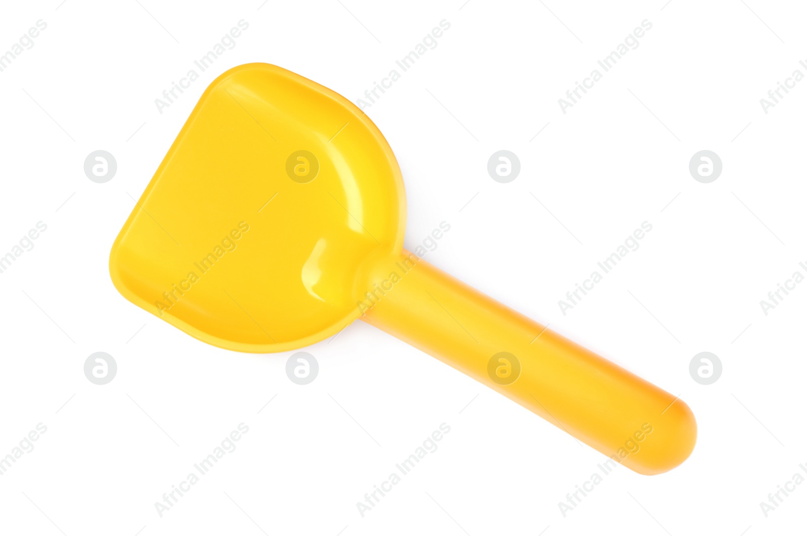 Photo of Yellow plastic toy shovel isolated on white, top view