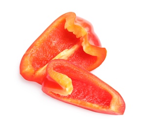 Photo of Slices of ripe red bell pepper on white background