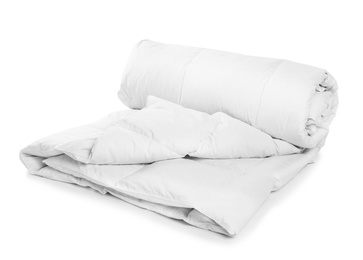 Photo of Rolled clean blanket on white background. Household textile