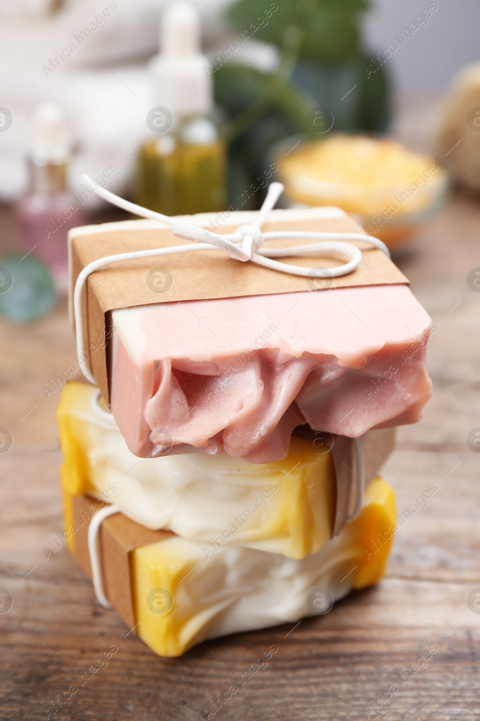 Photo of Natural handmade soap bars on wooden table