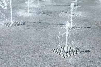 View of beautiful floor fountains on sunny day