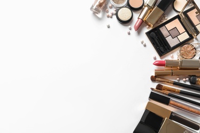 Photo of Set of luxury makeup products on white background, flat lay