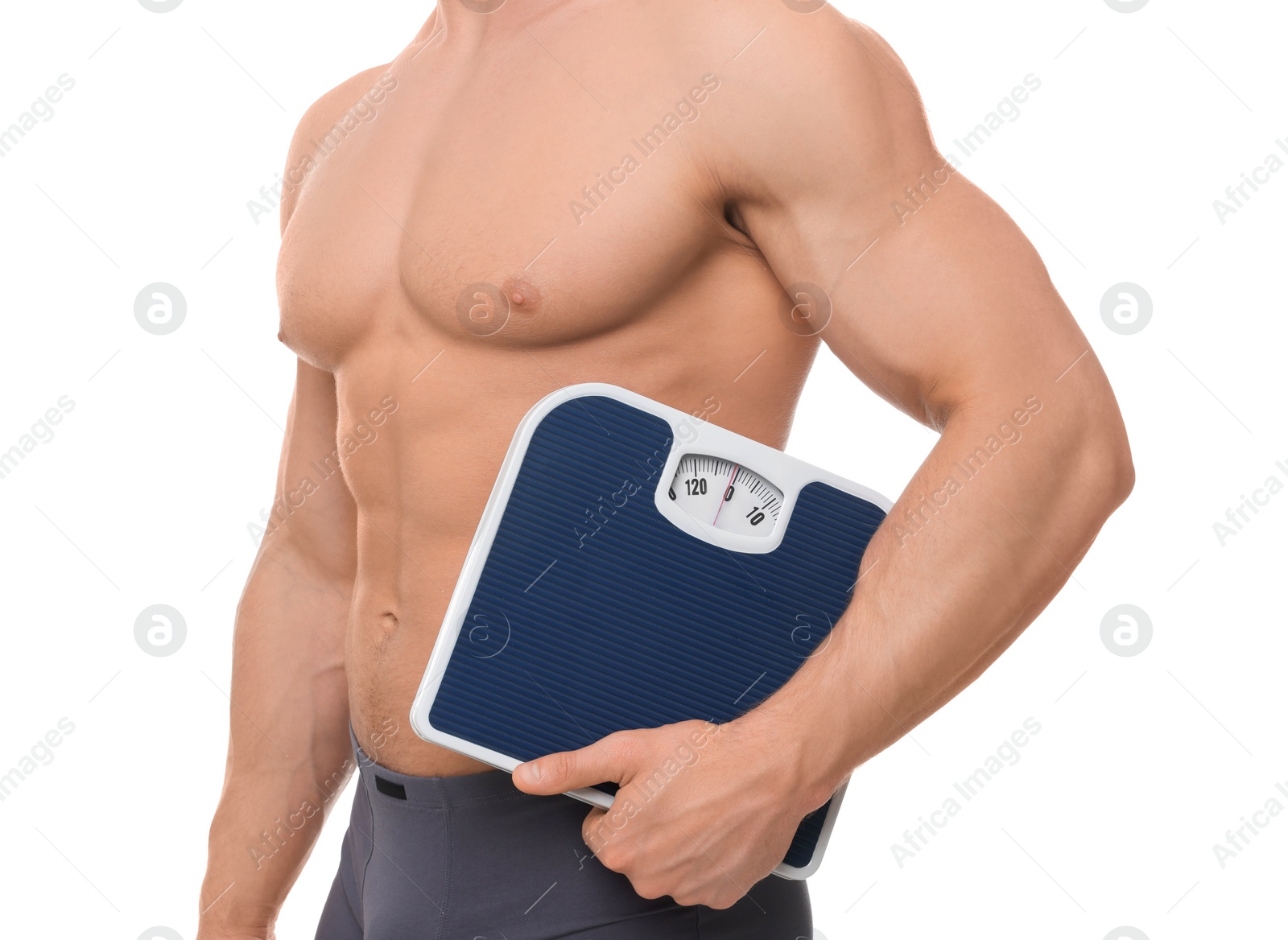 Photo of Athletic man holding scales on white background, closeup. Weight loss concept