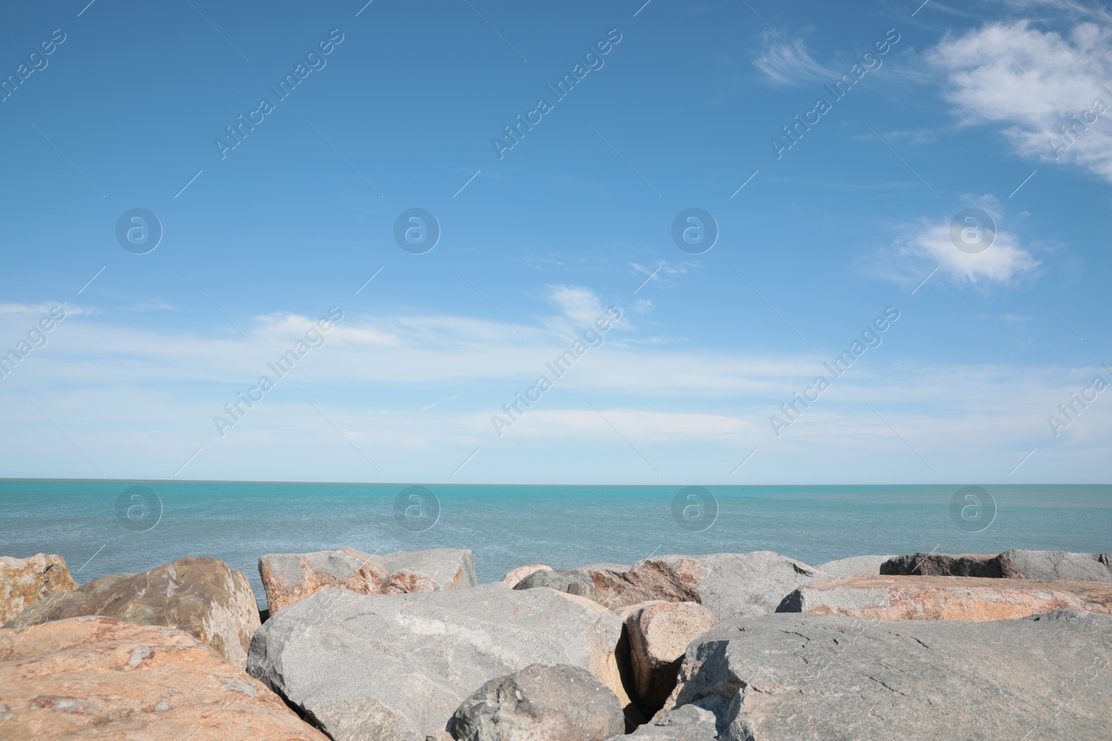 Photo of Picturesque view of beautiful rocky seacoast on sunny day