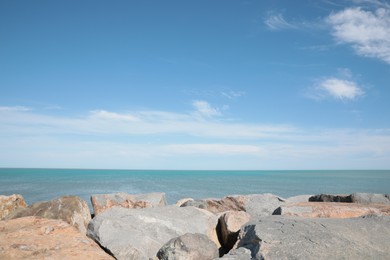 Photo of Picturesque view of beautiful rocky seacoast on sunny day