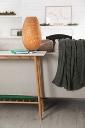 Living room interior with console table and stylish decor