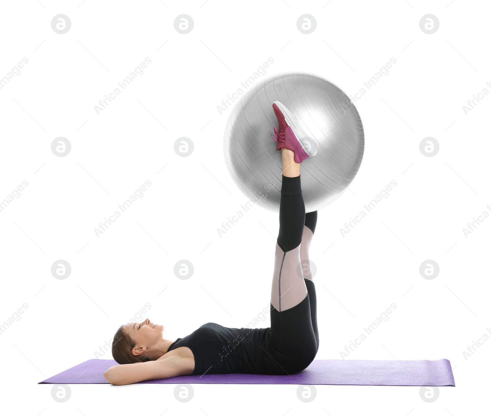 Photo of Young woman doing sports exercises isolated on white. Home fitness