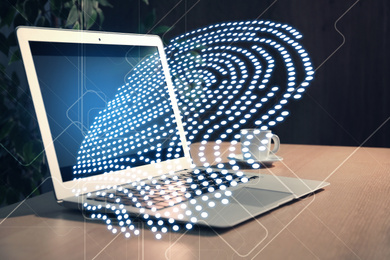 Image of Fingerprint identification. Modern laptop on table indoors