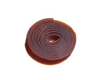 Delicious fruit leather roll isolated on white