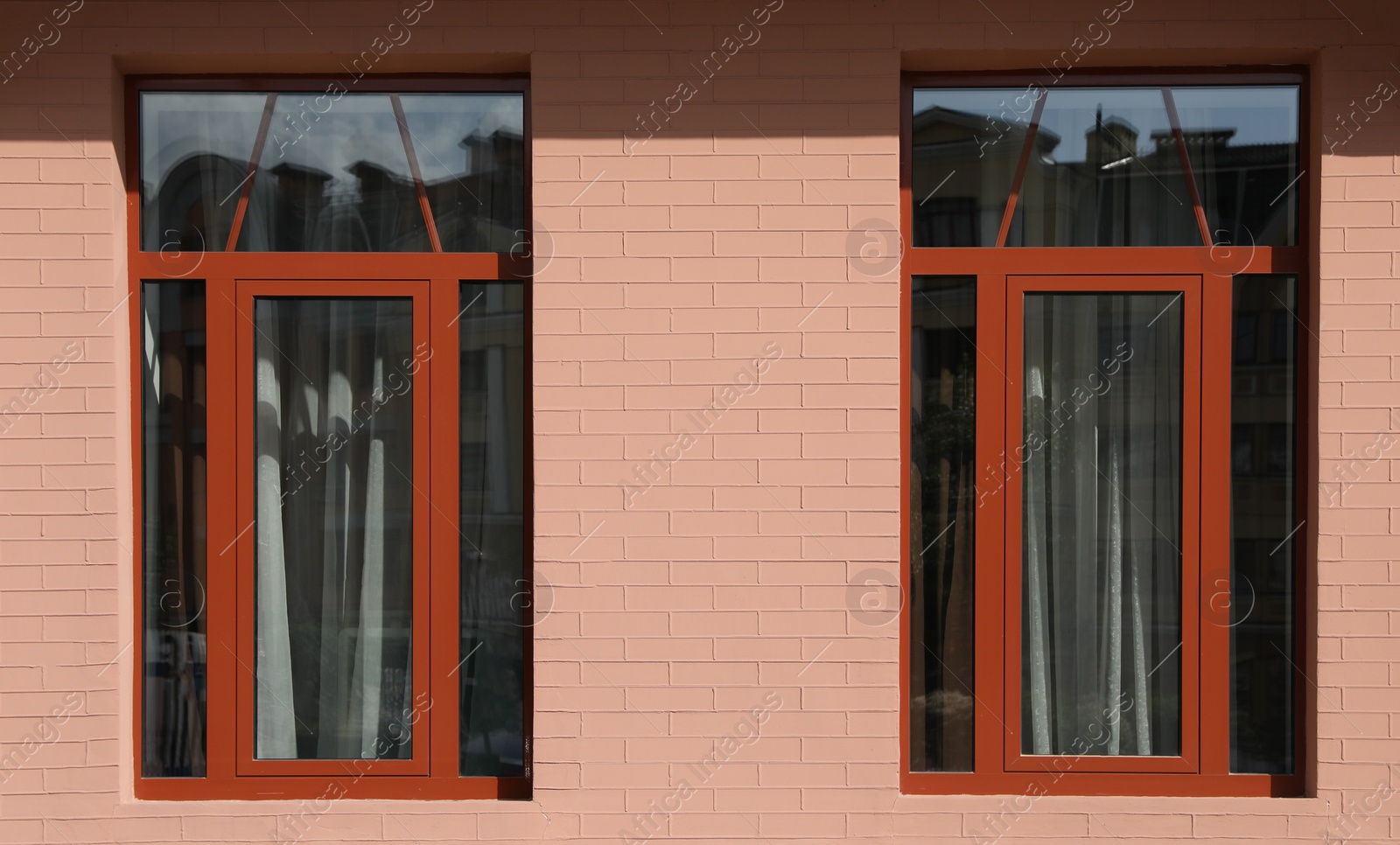 Photo of Wall of vintage building with beautiful windows