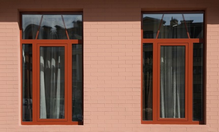 Wall of vintage building with beautiful windows