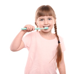 Photo of Little girl brushing teeth on white background