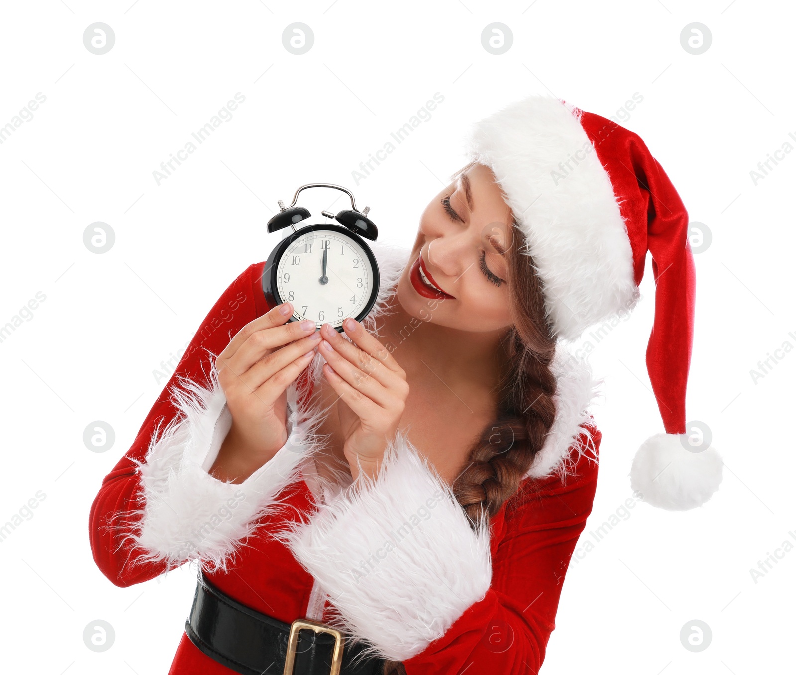 Photo of Beautiful Santa girl with alarm clock on white background. Christmas eve