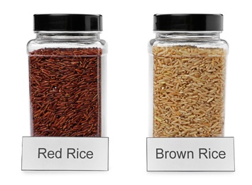 Photo of Red and brown rice in jars with labels, isolated on white. Mock up for design