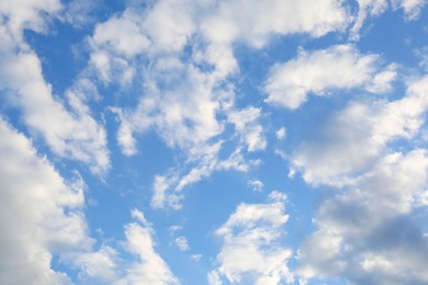 Photo of Picturesque view of beautiful fluffy clouds in light blue sky