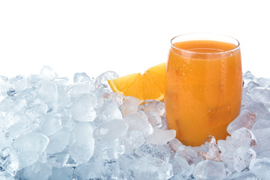 Ice cubes and orange juice on white background