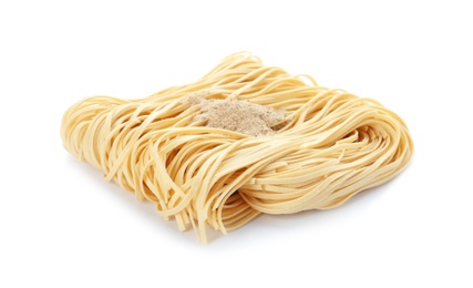 Photo of Block of quick cooking noodles with spices isolated on white