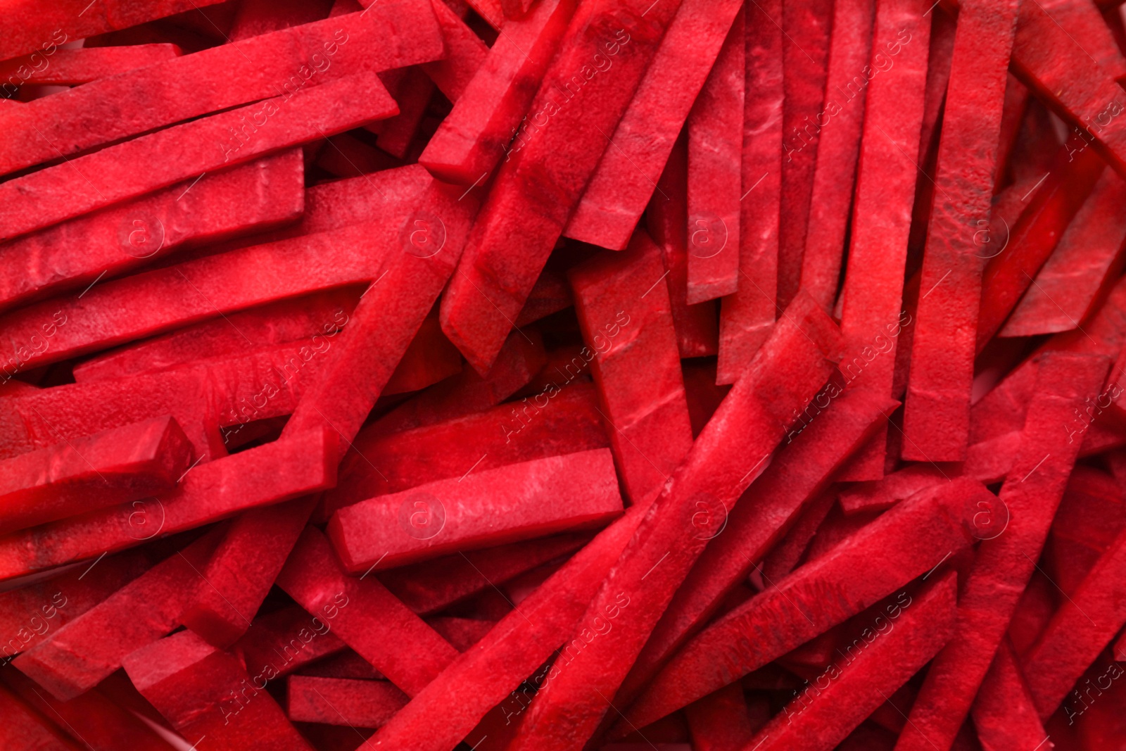 Photo of Cut fresh red beet as background, top view