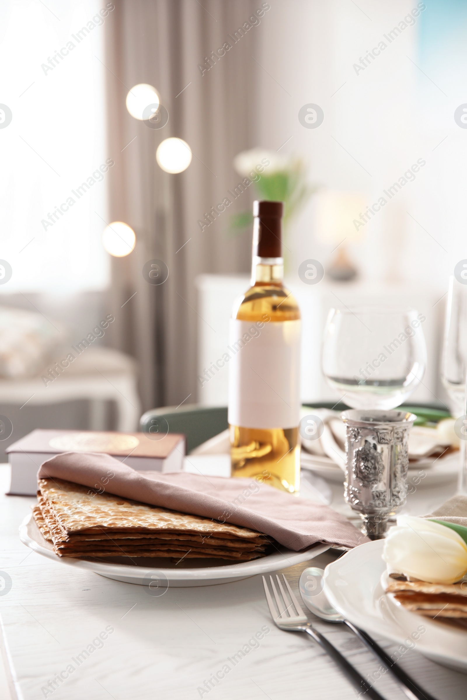 Photo of Festive Passover table setting at home. Pesach celebration