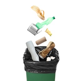 Image of Garbage falling into trash bin on white background