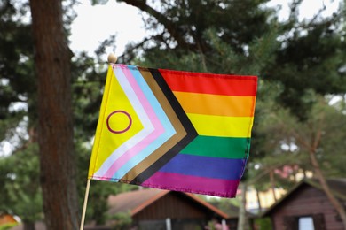 Photo of One intersex progress flag outdoors. LGBT pride