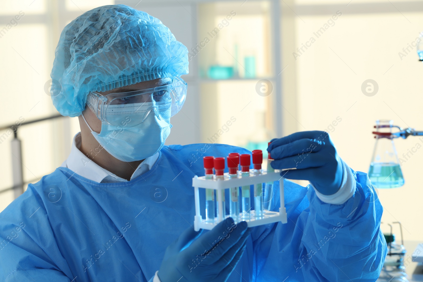 Photo of Scientist working with samples in laboratory. Medical research