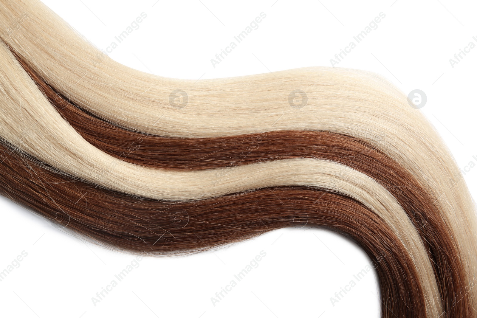 Photo of Strands of different color hair on white background