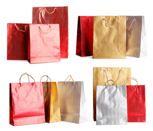 Image of Set of paper shopping bags on white background