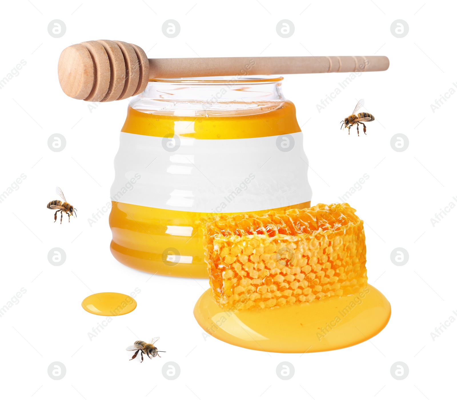 Image of Sweet honey in glass jar with blank label, honey dipper, piece of honeycomb and flying bees on white background. Mockup for design